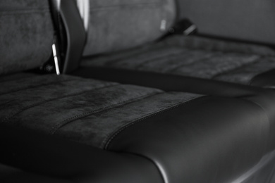 Car seat with leather upholstery, closeup view