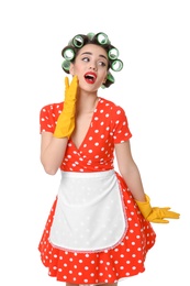 Photo of Funny young housewife with hair rollers and rubber gloves on white background