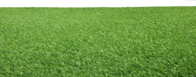 Photo of Green artificial grass surface isolated on white