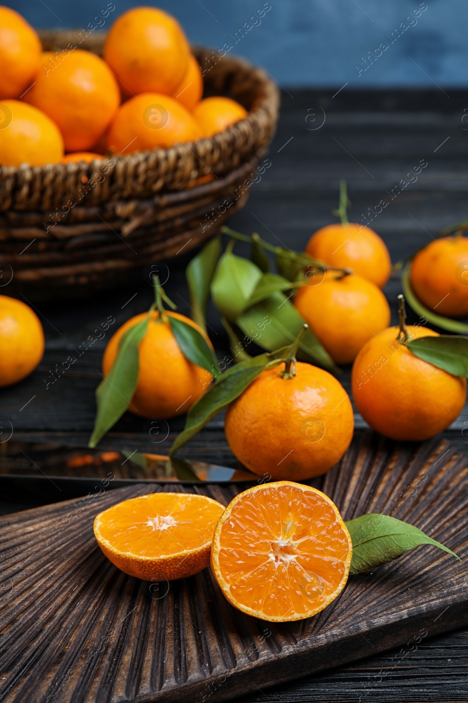 Photo of Composition with fresh ripe tangerines on table