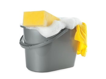 Plastic bucket with foam and sponge on white background. Cleaning supplies