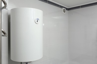 Photo of White boiler with temperature control indicator indoors, space for text