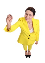 Photo of Beautiful businesswoman in yellow suit with marker on white background, above view