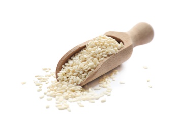 Photo of Wooden scoop with sesame seeds on white background