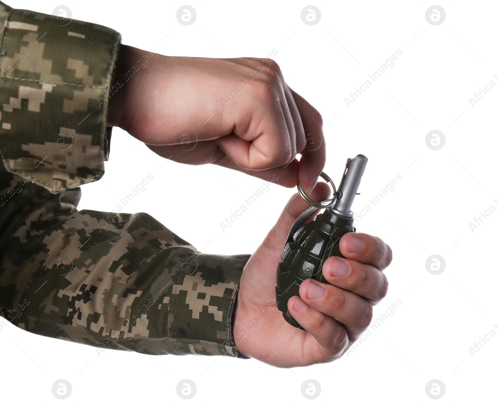 Photo of Soldier pulling safety pin out of hand grenade on white background, closeup