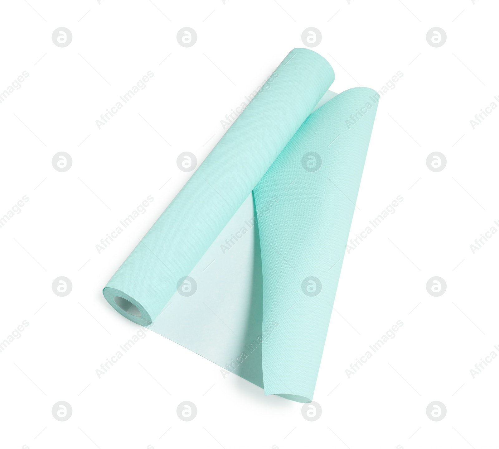 Photo of One light turquoise wallpaper roll isolated on white, top view