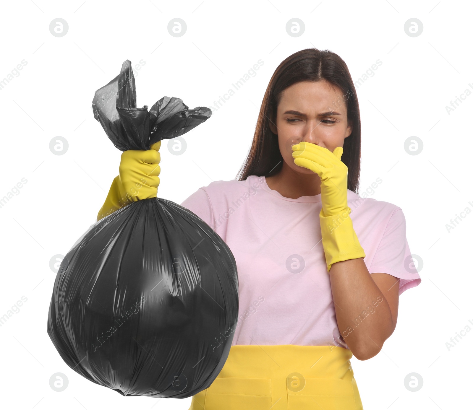 Photo of Woman holding full garbage bag on white background