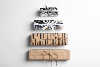 Beautiful gift boxes on white background, top view