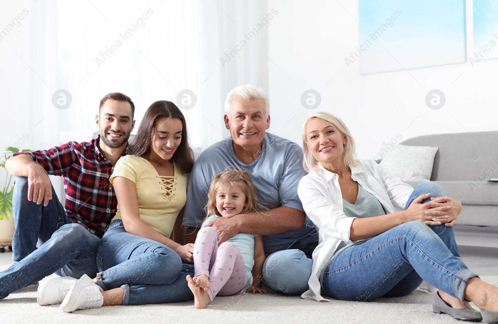 Photo of Happy family at home. Reunion of generations