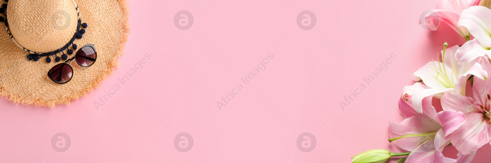 Image of Flat lay composition with vacation accessories and flowers on pink background, space for text. Banner design