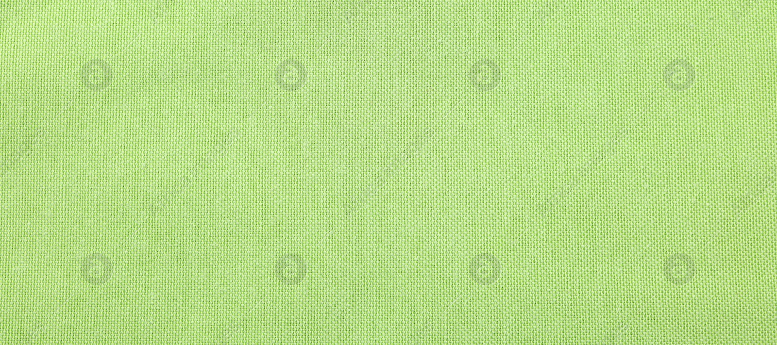 Photo of Texture of light green fabric as background, top view