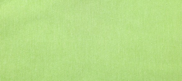 Photo of Texture of light green fabric as background, top view