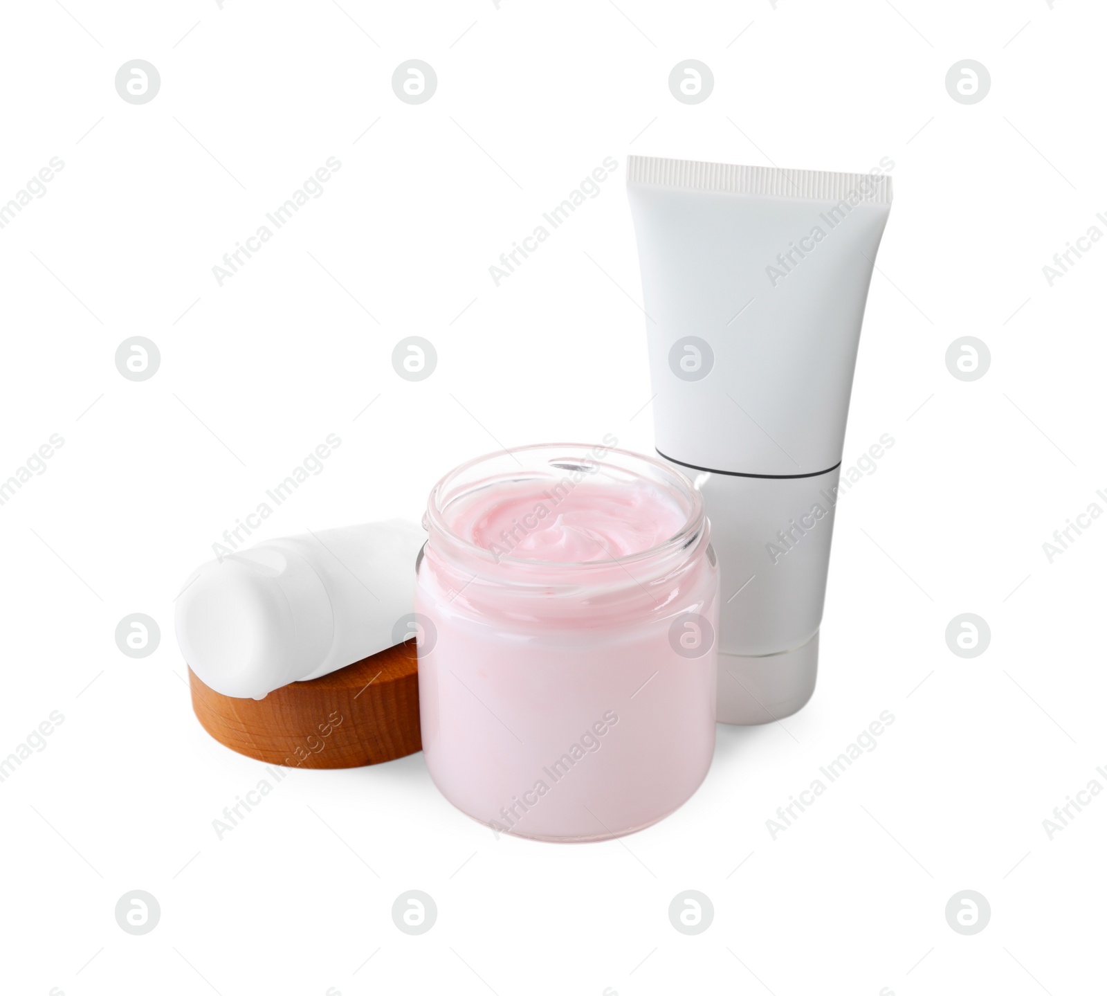 Photo of Jar and tubes of hand cream on white background