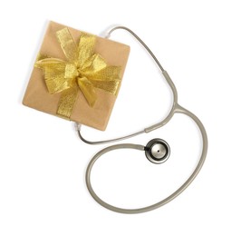 Stethoscope and gift box on white background, flat lay. Happy Doctor's Day