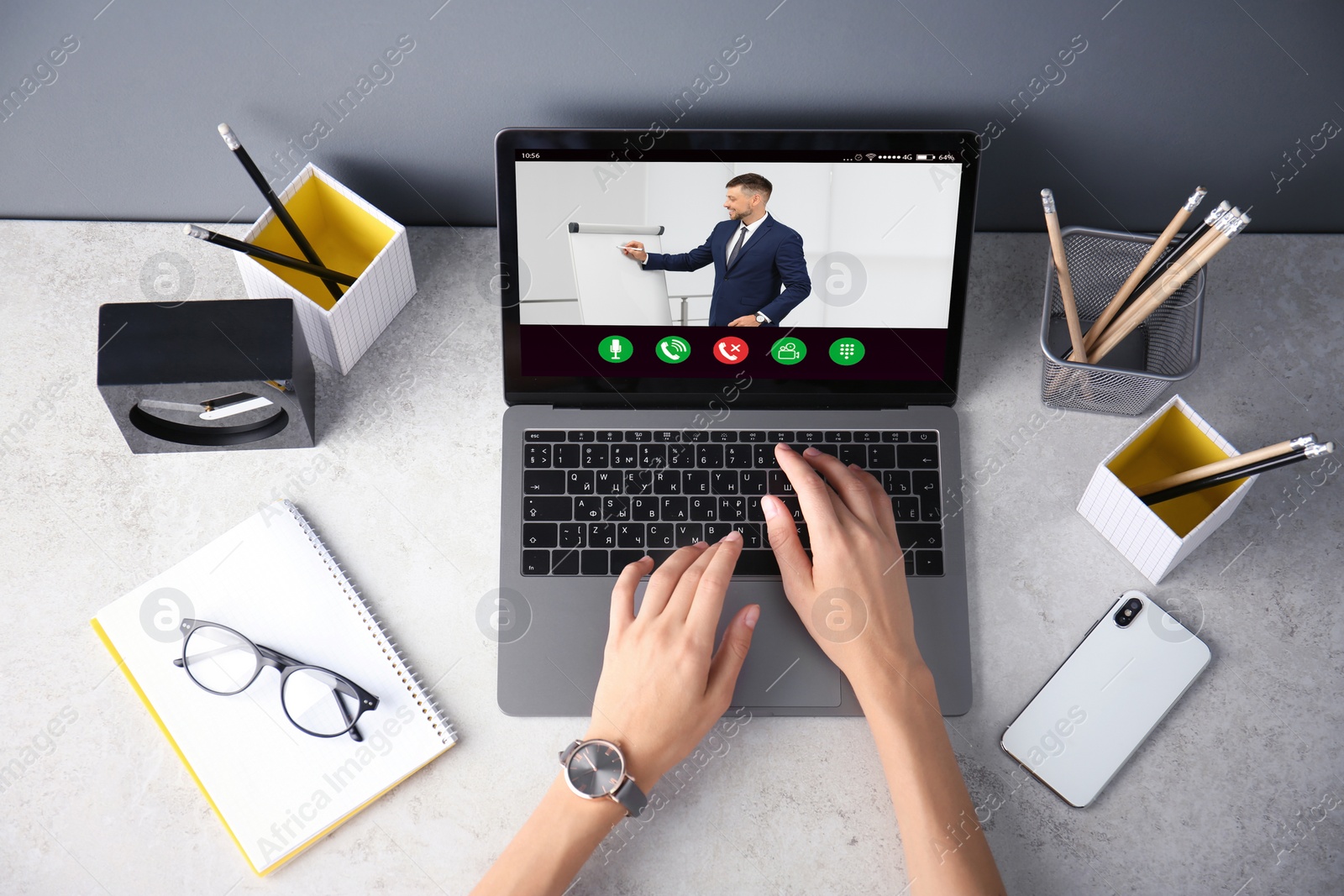 Image of Woman having online video consultation with business trainer at table, top view