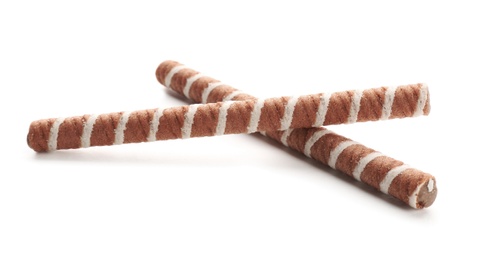 Tasty wafer roll sticks on white background. Crispy food