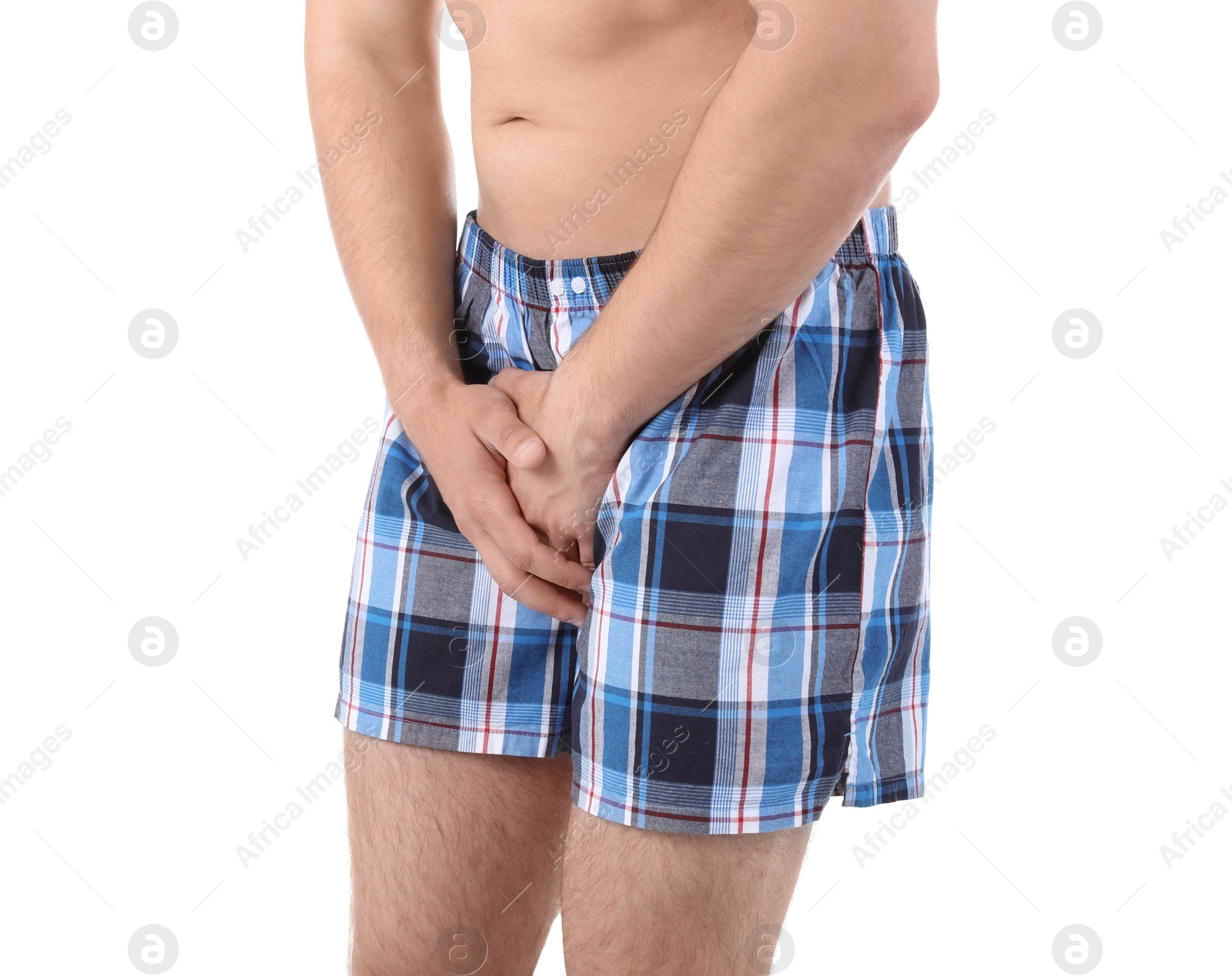 Photo of Young man with urological problems suffering from pain on white background