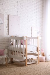 Baby room interior with toys and stylish furniture