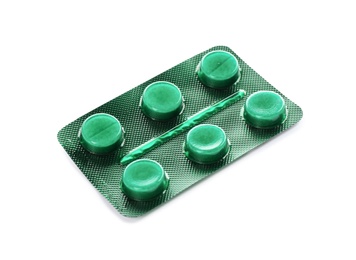 Photo of Pills in blister pack on white background. Medical treatment