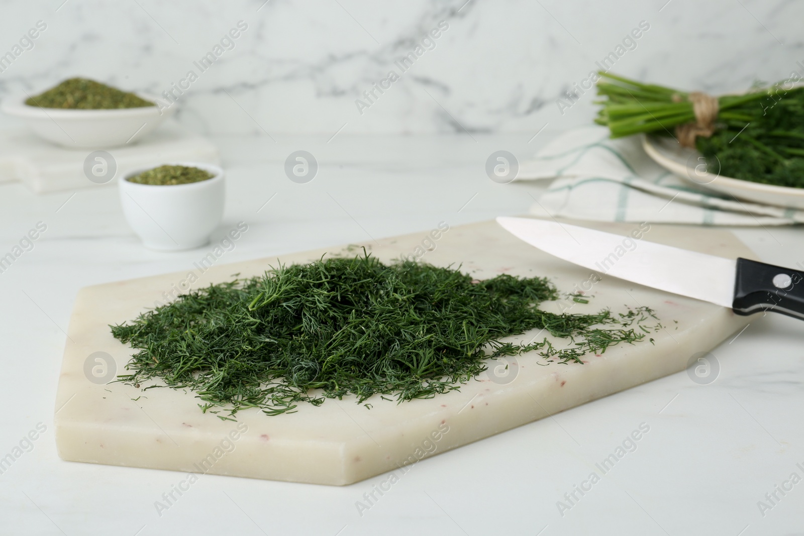 Photo of Fresh dill preparing for drying on white board