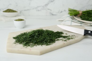 Fresh dill preparing for drying on white board