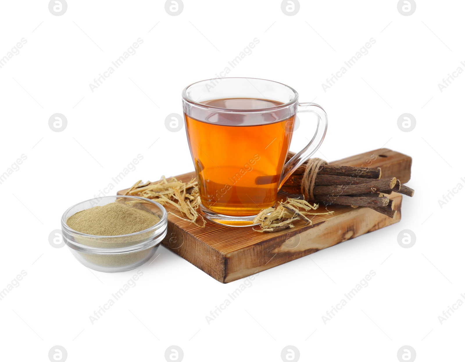 Photo of Aromatic licorice tea in cup, dried sticks of licorice root and powder isolated on white