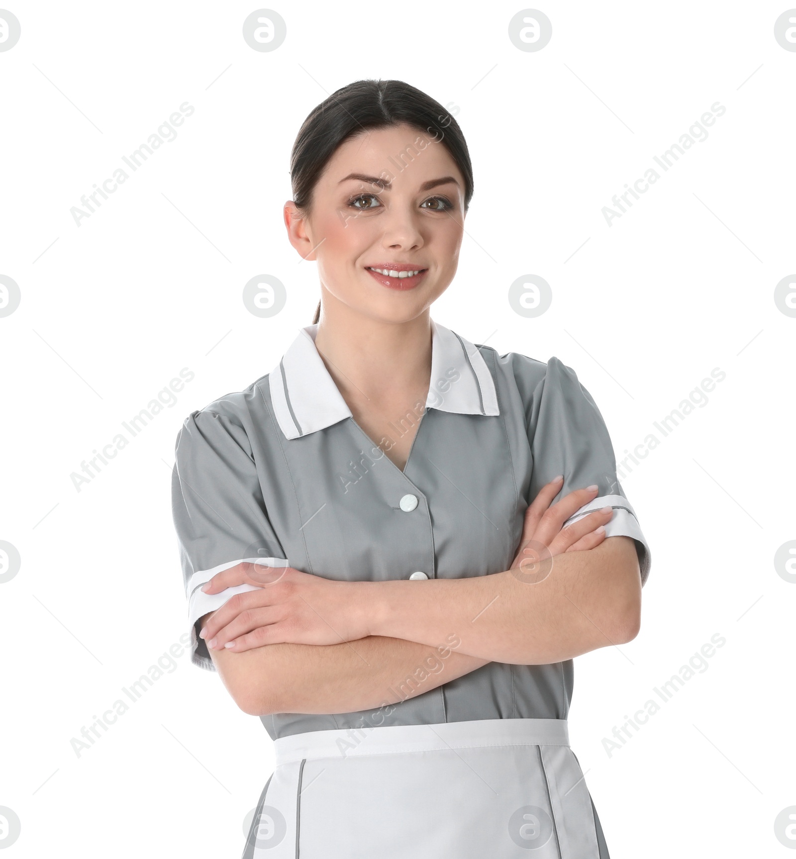 Photo of Young chambermaid in uniform on white background