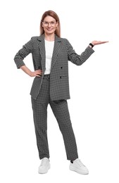 Photo of Beautiful happy businesswoman in suit welcoming on white background