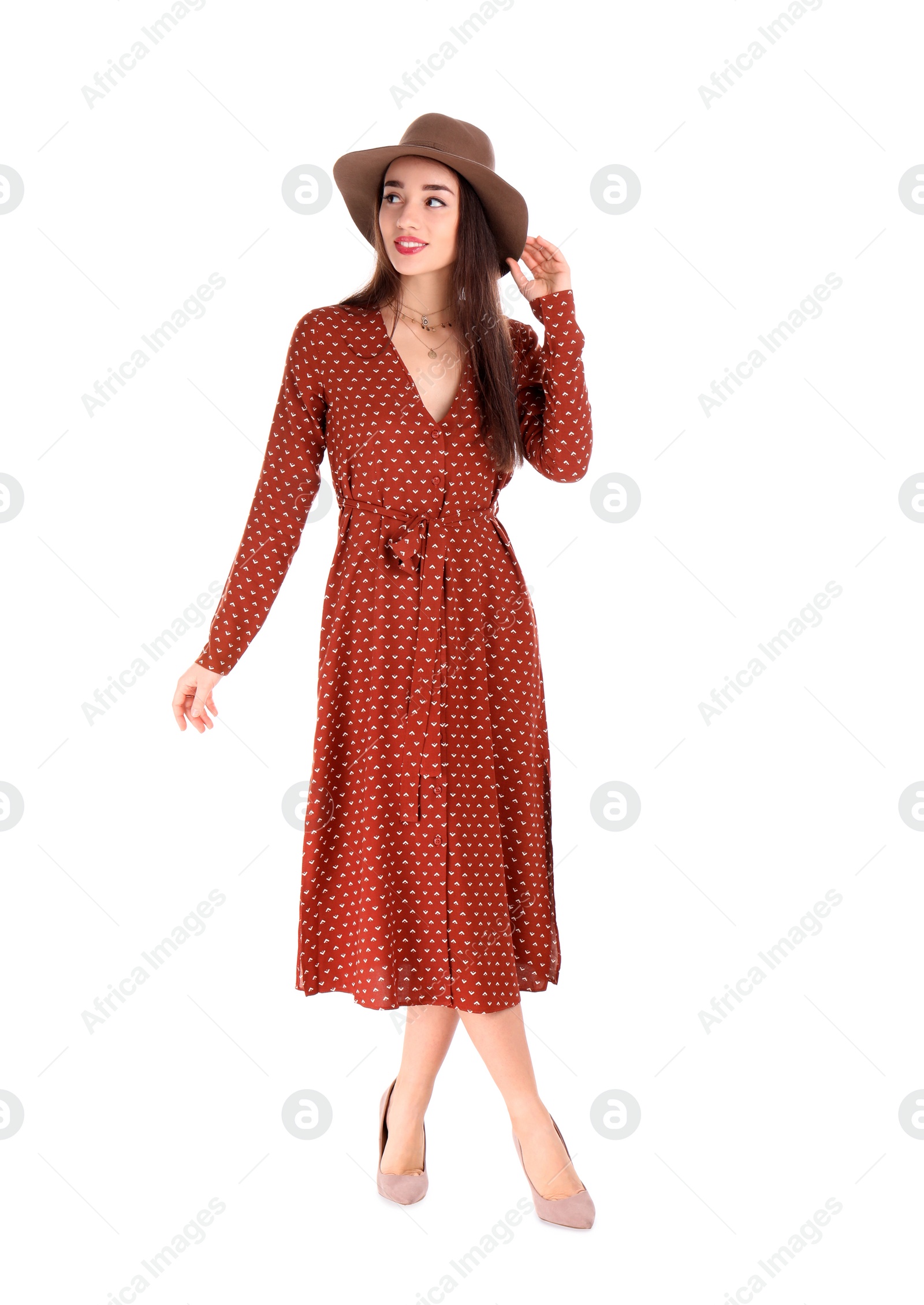 Photo of Portrait of beautiful young woman in stylish dress on white background