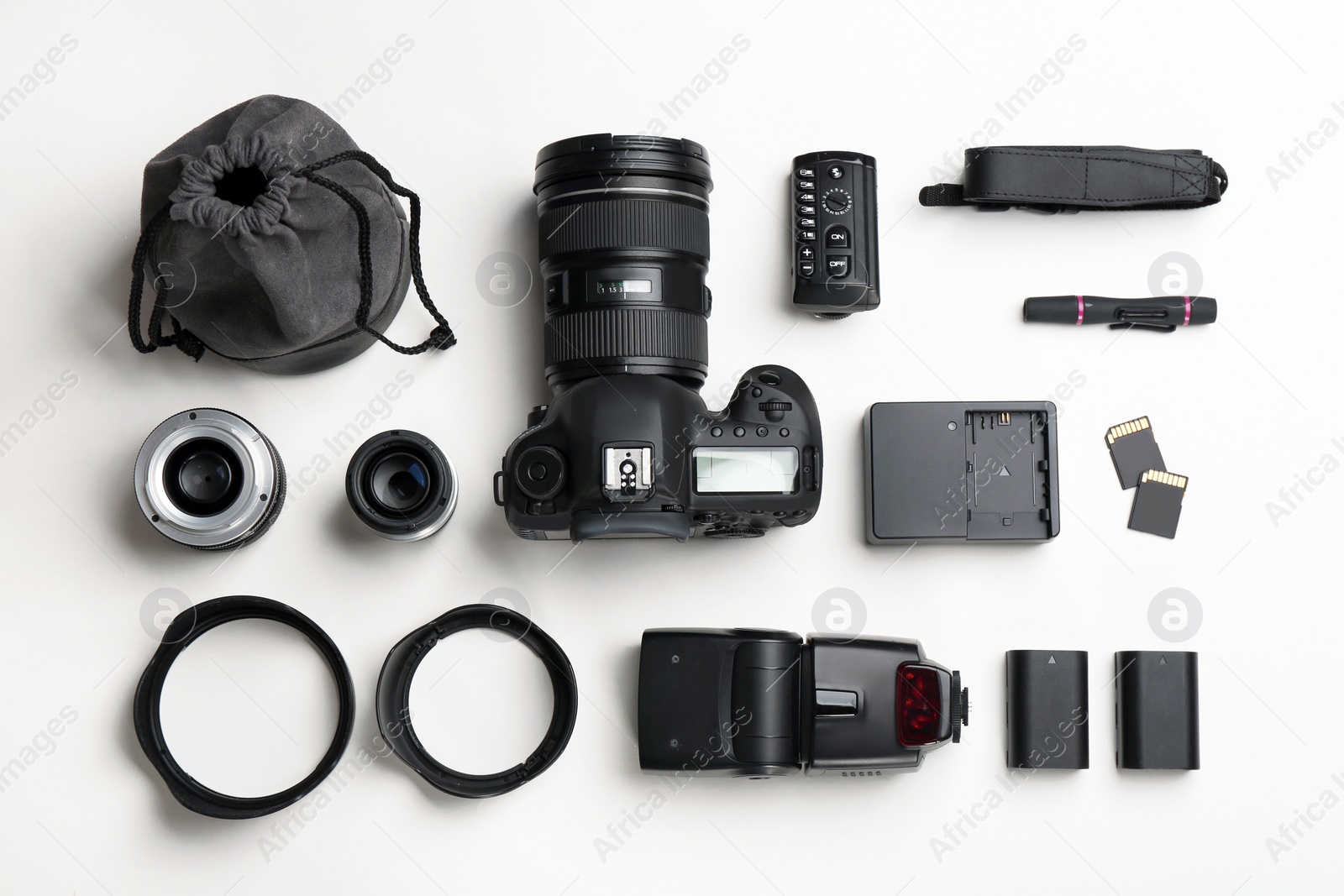 Photo of Flat lay composition with photographer's equipment and accessories on white background