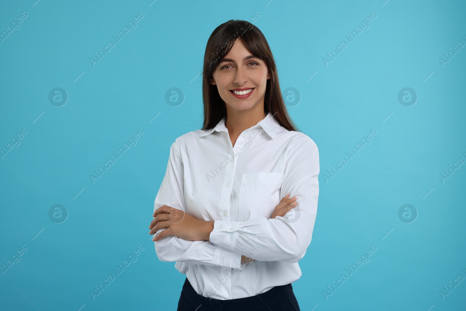 Photo of Portrait of happy secretary on light blue background