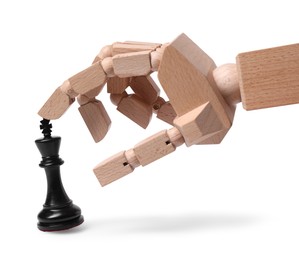 Robot touching king isolated on white. Wooden hand representing artificial intelligence playing chess