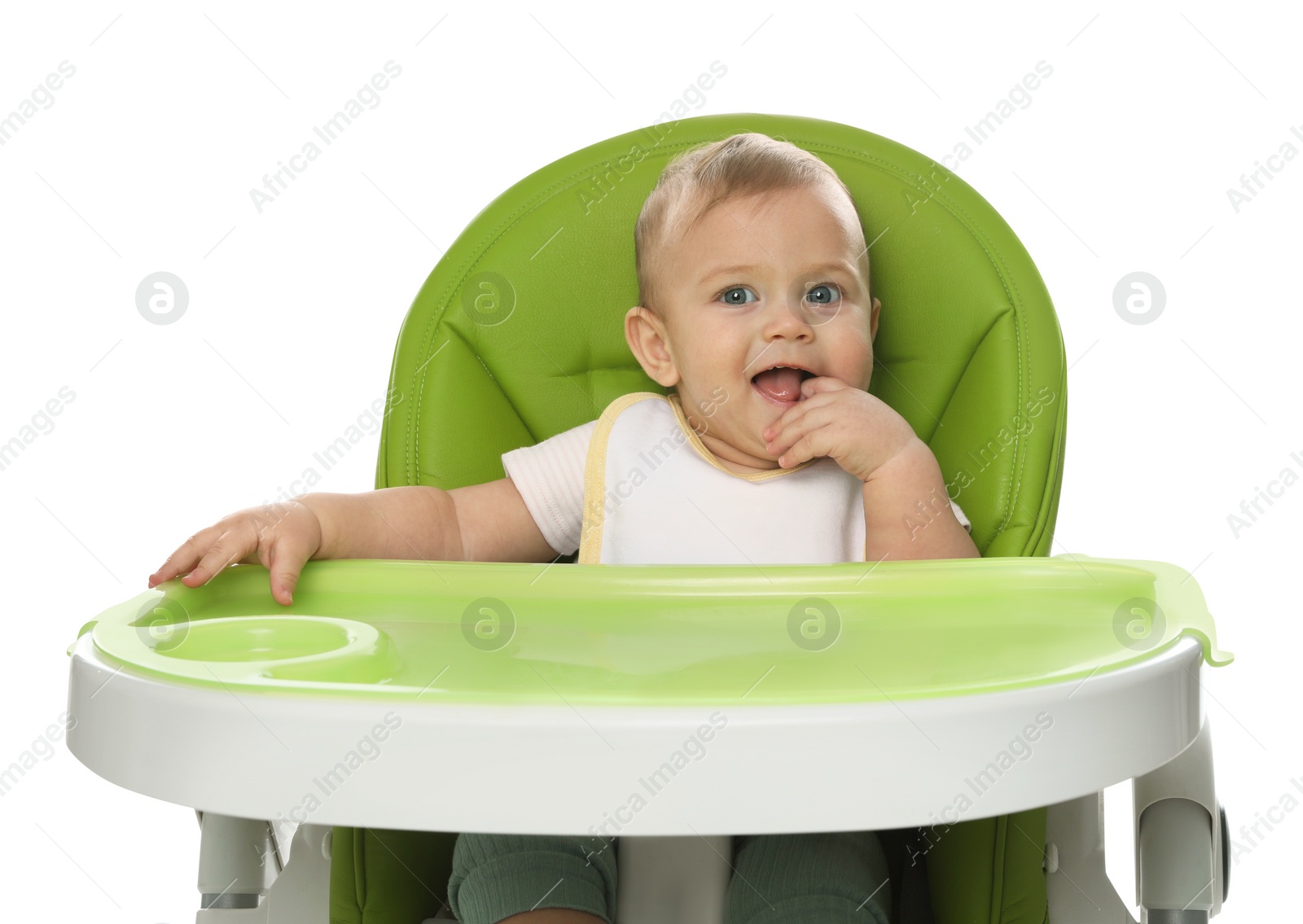 Photo of Cute little baby wearing bib in highchair on white background