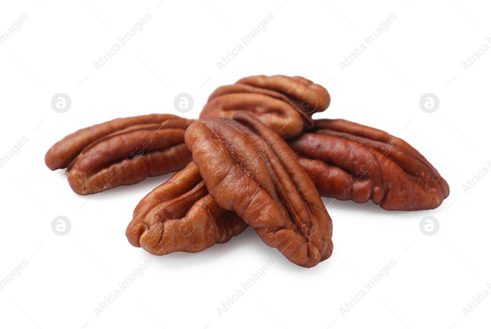 Photo of Many tasty pecan nuts isolated on white