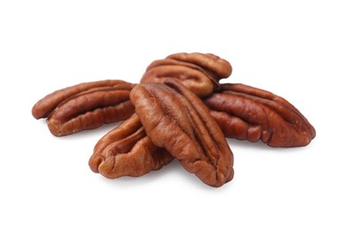 Photo of Many tasty pecan nuts isolated on white