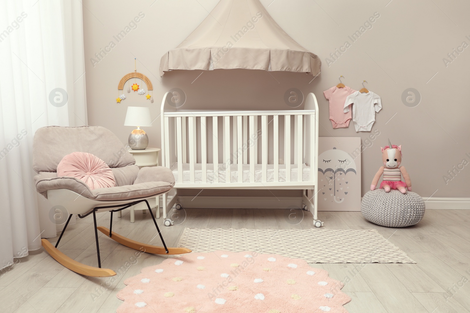 Photo of Modern baby room interior with stylish crib