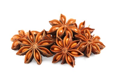 Dry anise stars with seeds on white background