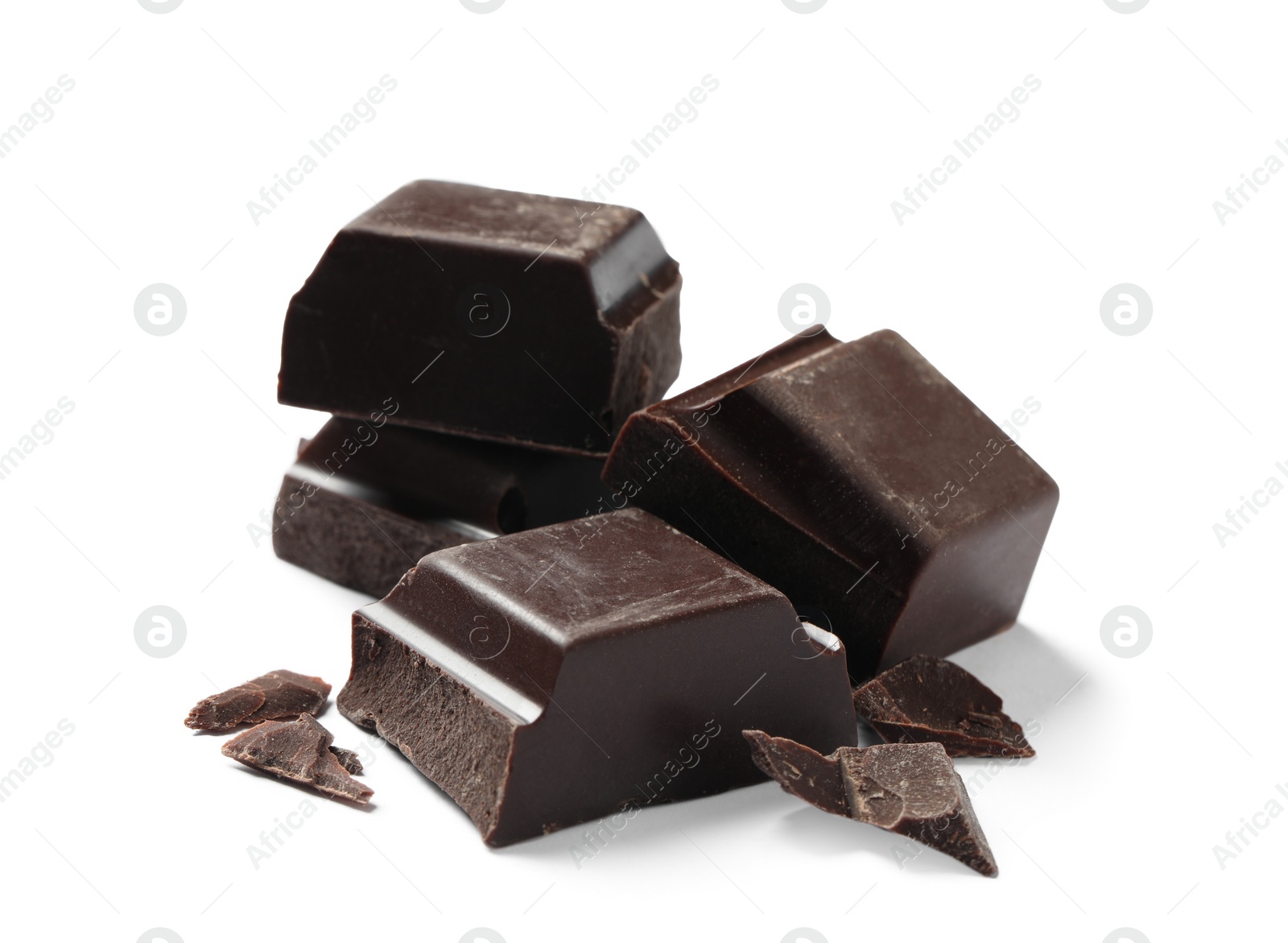 Photo of Pieces of delicious dark chocolate isolated on white