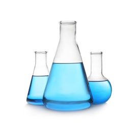 Photo of Florence and conical flasks with blue liquid on white background. Laboratory glassware