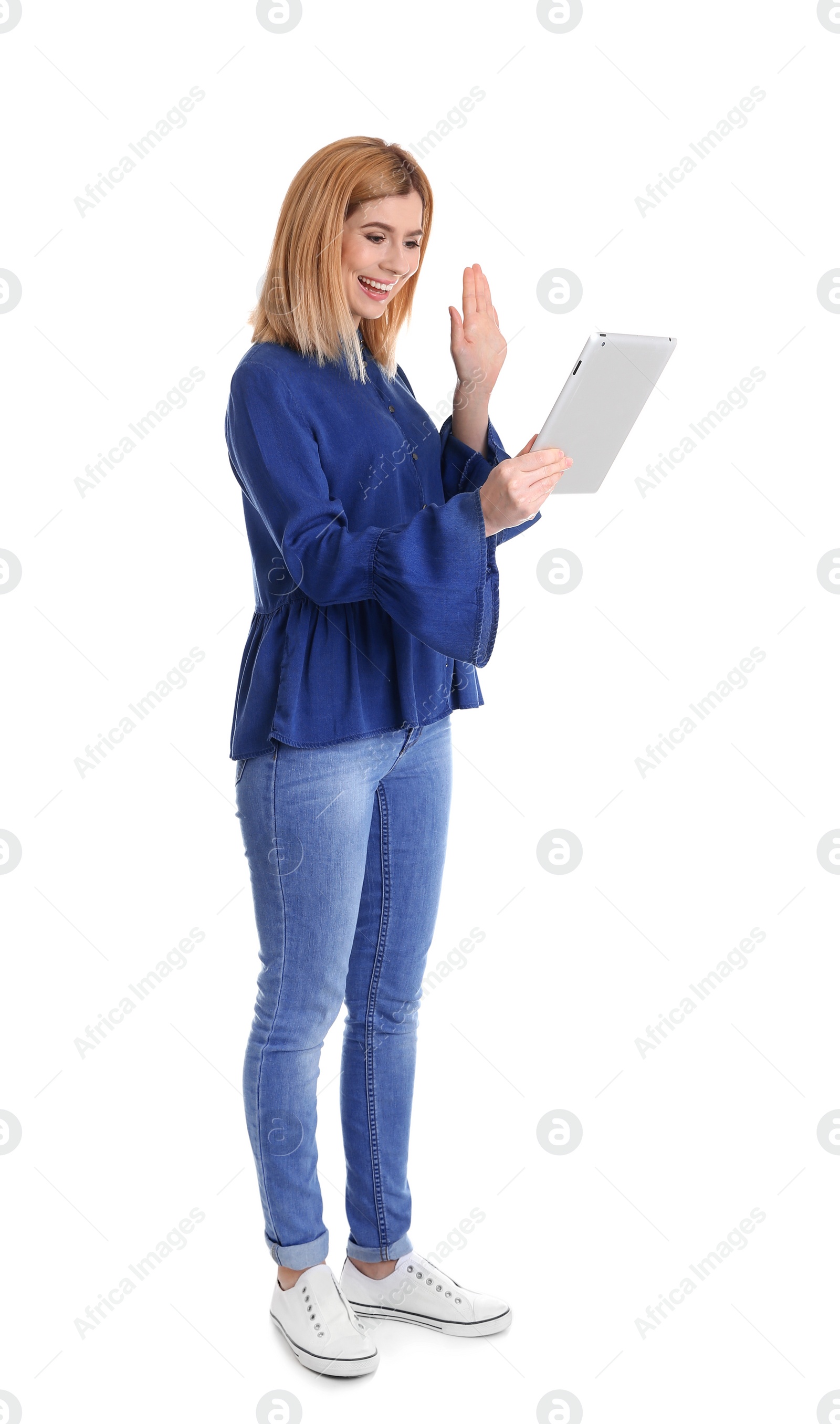 Photo of Woman using tablet for video chat isolated on white