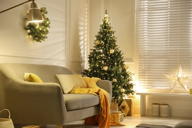 Photo of Stylish room with Christmas decorations. Festive interior design