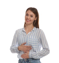 Photo of Healthy woman holding hands on belly against white background