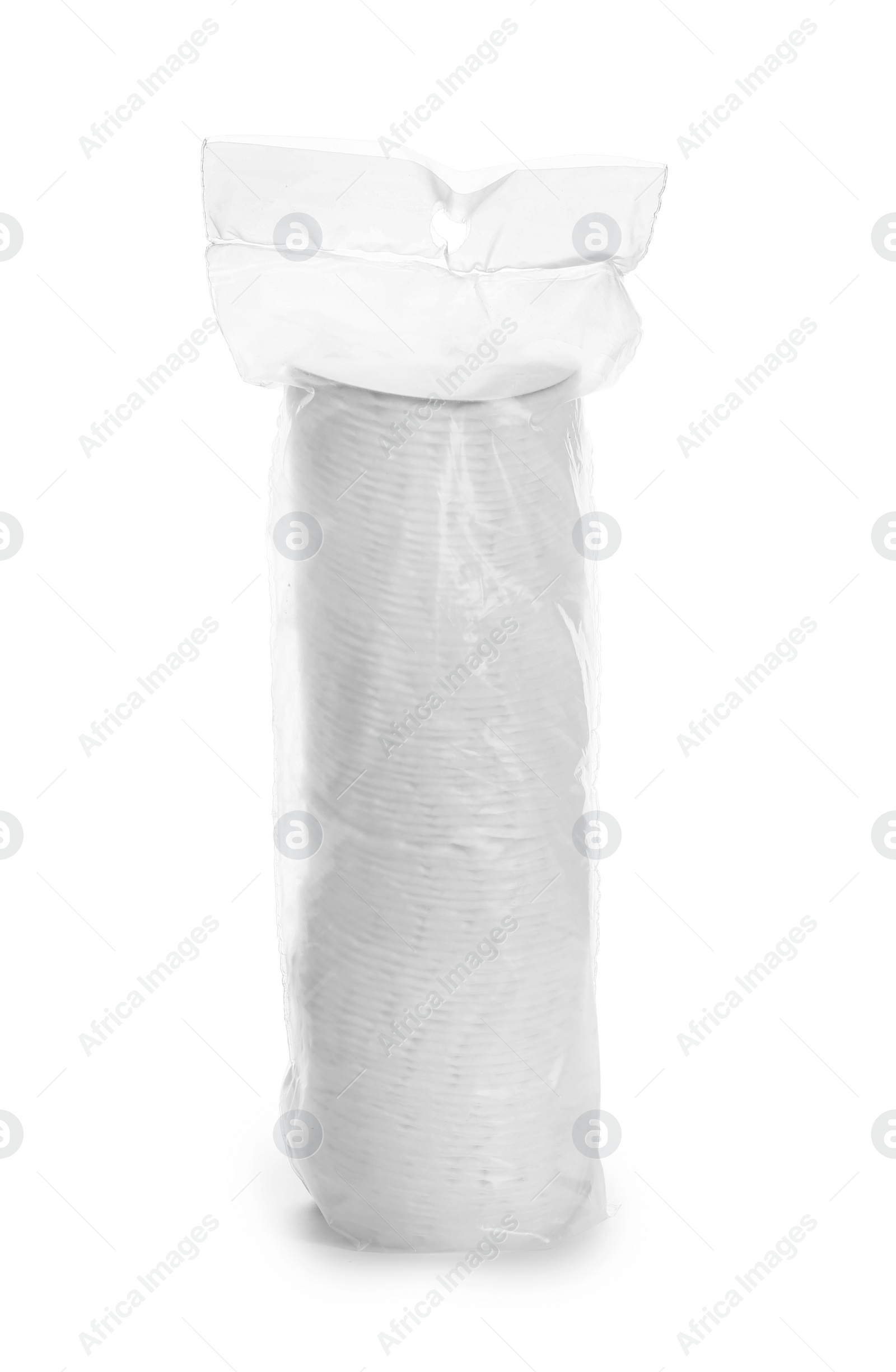 Photo of Cotton pads in plastic package on white background