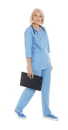 Photo of Full length portrait of female doctor in scrubs isolated on white. Medical staff