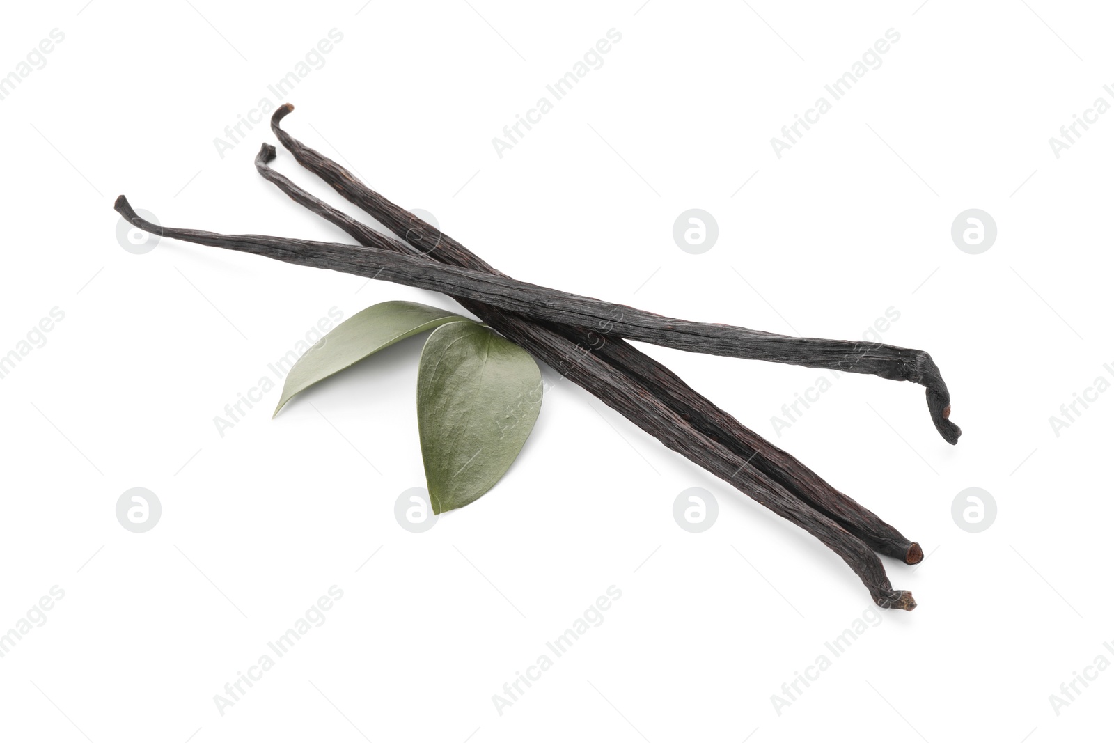 Photo of Aromatic vanilla pods and leaves isolated on white