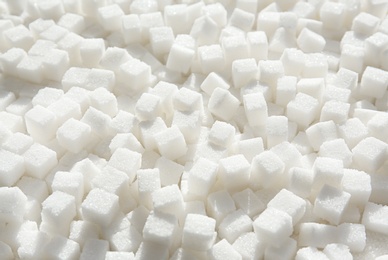 Photo of Refined sugar cubes as background