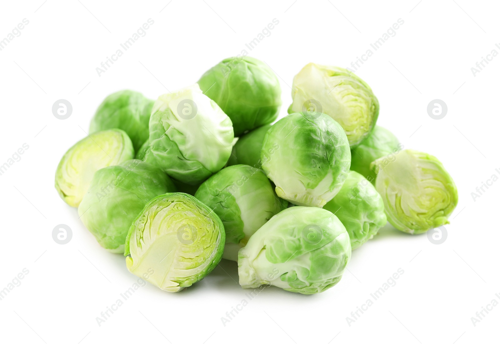 Photo of Pile of fresh Brussels sprouts isolated on white