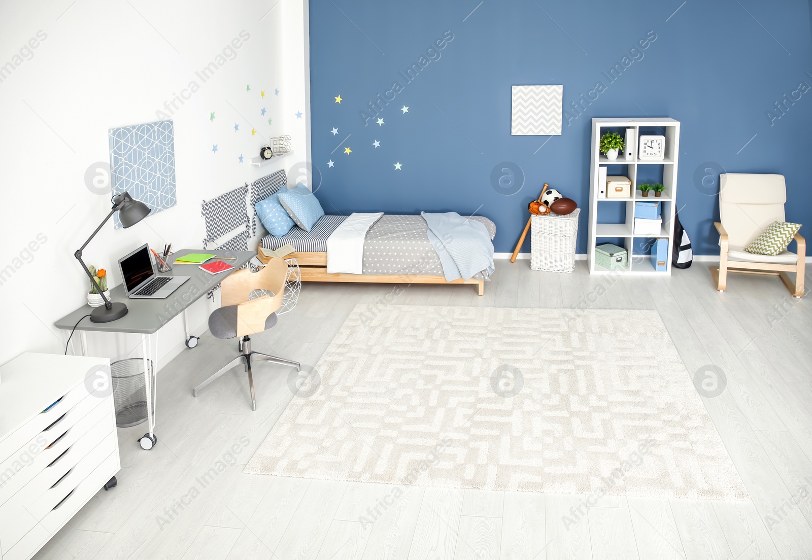 Photo of Modern child room interior with comfortable bed and desk