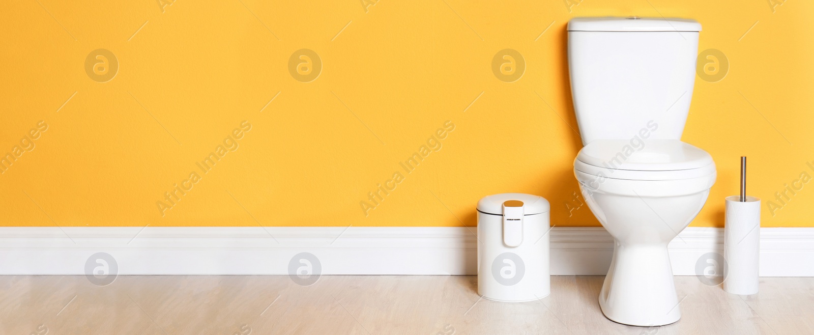 Image of New ceramic toilet bowl in bathroom, space for text. Banner design