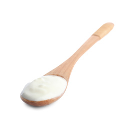 Photo of Wooden spoon with tasty organic yogurt isolated on white